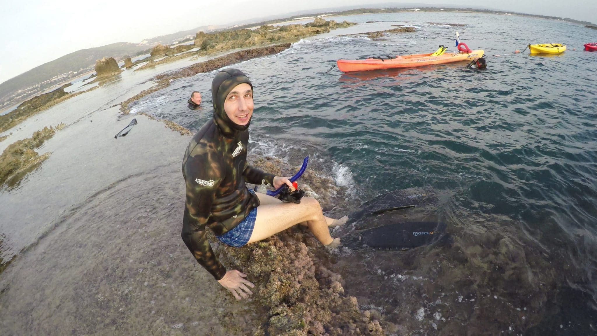 A snorkeler on an abrasion platform. Photo: Andrey Aharonov.